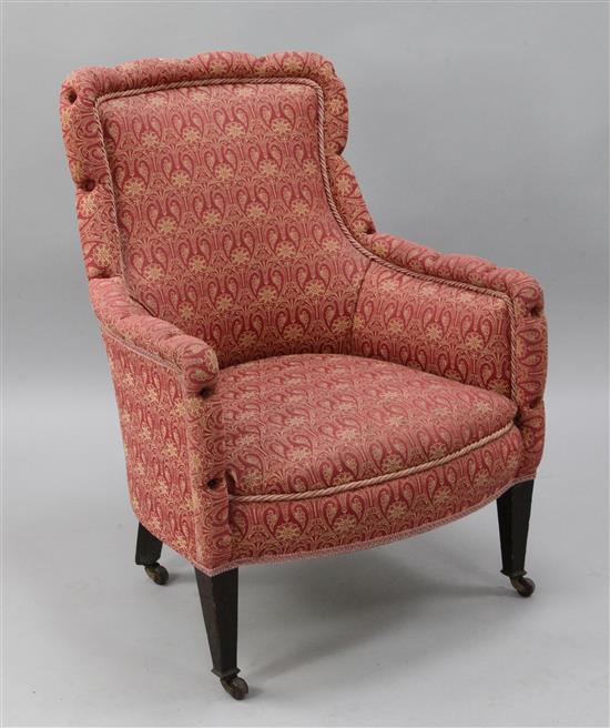 An Edwardian mahogany framed nursing chair.